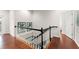 Upstairs landing with views of the beverage bar at 15007 Laurel Cove Cir, Odessa, FL 33556