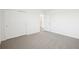 Bedroom with neutral carpeting and a closet at 3544 Moscato Dr, Brooksville, FL 34602