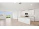 Modern kitchen features granite countertops, stainless steel appliances, and bright white cabinets at 3544 Moscato Dr, Brooksville, FL 34602