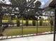 View from screened-in lanai featuring pond view at 1403 Ventana Dr, Sun City Center, FL 33573
