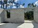Cinder block walls on a concrete foundation showing planned window and door placement of a new home at 18141 Spartonvail Ave, Port Charlotte, FL 33954