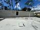 Concrete foundation with cinder block walls displaying window placements for a new home at 18141 Spartonvail Ave, Port Charlotte, FL 33954