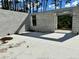 Cinder block construction over concrete slab foundation. View shows planned window and door placements at 18141 Spartonvail Ave, Port Charlotte, FL 33954