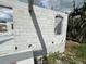 New home construction shows block foundation with window opening and concrete slab ready for framing at 18141 Spartonvail Ave, Port Charlotte, FL 33954