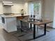 Modern kitchen with seating for four at island at 1300 Pleasant S Way, St Petersburg, FL 33705
