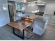 Kitchen featuring custom island with wood table at 1300 Pleasant S Way, St Petersburg, FL 33705