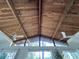 Vaulted ceilings with wood beams and ceiling fans at 1300 Pleasant S Way, St Petersburg, FL 33705