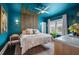 Charming bedroom with unique design, ceiling fan, and ample natural light for a comfortable retreat at 132 17Th N Ave, St Petersburg, FL 33704
