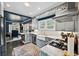 Bright kitchen with stainless steel appliances, ample counter space, and an open design into the dining area at 132 17Th N Ave, St Petersburg, FL 33704