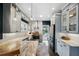 Modern kitchen featuring stainless steel appliances, pendant lighting, and views to the backyard at 132 17Th N Ave, St Petersburg, FL 33704