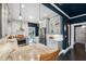 Well-lit kitchen featuring stainless steel appliances, granite countertops, and stylish cabinets at 132 17Th N Ave, St Petersburg, FL 33704