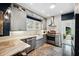 Stylish kitchen with stainless steel appliances, a farmhouse sink, and ample counter space at 132 17Th N Ave, St Petersburg, FL 33704