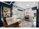 Modern kitchen featuring stainless steel appliances, stylish lighting, and dark hardwood floors at 132 17Th N Ave, St Petersburg, FL 33704