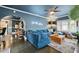Spacious living room with a comfortable blue sofa and stylish decor at 132 17Th N Ave, St Petersburg, FL 33704