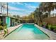 Beautiful pool and spa surrounded by pavers and lush tropical landscaping create an outdoor oasis at 132 17Th N Ave, St Petersburg, FL 33704