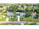 Spacious property featuring a well-maintained home, large yard, and covered RV parking at 13295 Don Loop, Spring Hill, FL 34609