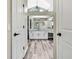 En Suite bathroom featuring dual sinks and granite countertop at 13295 Don Loop, Spring Hill, FL 34609