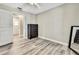 Bedroom with views to additional bedroom and hall, new flooring at 13295 Don Loop, Spring Hill, FL 34609