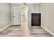 Bedroom with views to additional bedroom and hall, new flooring at 13295 Don Loop, Spring Hill, FL 34609