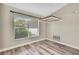 Bright dining room featuring modern lighting and large window with natural views at 13295 Don Loop, Spring Hill, FL 34609