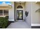 Charming home featuring a covered entryway and double door entry at 13295 Don Loop, Spring Hill, FL 34609