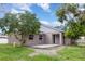 A spacious backyard offers privacy and natural beauty with plenty of room for outdoor activities at 4358 Murdock Ave, Sarasota, FL 34231