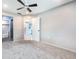 Spacious bedroom showcases neutral walls, plush carpet, and ceiling fan for comfortable living at 4358 Murdock Ave, Sarasota, FL 34231