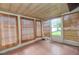 Bright sunroom featuring natural light, neutral paint, and multiple windows with natural blinds at 4358 Murdock Ave, Sarasota, FL 34231