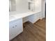 Bright bathroom featuring a double sink vanity and modern finishes at 5511 Drinkard Dr, New Port Richey, FL 34653