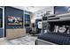 Stylized bedroom featuring a baseball theme, bunk bed and flat screen television at 14375 Hammock Oak St, Parrish, FL 34219