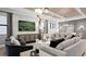 Sophisticated living area with stylish furnishings, modern decor, and an open layout at 14375 Hammock Oak St, Parrish, FL 34219