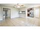 The open floor plan has a bright living area that connects to the kitchen with sleek appliances at 2002 Culpepper Dr, Brandon, FL 33511