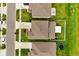 Aerial view of home roofs and neighborhood streets showcasing residential layout and community setting at 4704 Wild Senna Blvd, Tampa, FL 33619