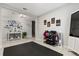 Home gym features workout equipment and decor at 4704 Wild Senna Blvd, Tampa, FL 33619