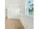 Spacious bedroom with ample closet space and a window with a view at 6208 S Harold Ave, Tampa, FL 33616