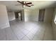 Expansive living space featuring tile flooring and an open layout at 7240 Rosarian Dr, Port Richey, FL 34668