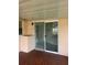 A view from the patio, showcasing sliding glass doors at 7240 Rosarian Dr, Port Richey, FL 34668