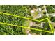 Aerial shot of property with land outline at 26627 Brahma Dr, Wesley Chapel, FL 33544