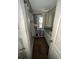 Bathroom with a single sink, vanity, and carpet flooring at 26627 Brahma Dr, Wesley Chapel, FL 33544
