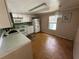 Vintage kitchen with white appliances at 26627 Brahma Dr, Wesley Chapel, FL 33544