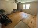 Living room needing repair at 26627 Brahma Dr, Wesley Chapel, FL 33544
