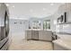Bright, modern kitchen features stainless steel appliances, sleek cabinets and beautiful countertop space at 11019 Pine Lilly Pl, Lakewood Ranch, FL 34202