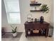 Coffee bar nook featuring built-in shelving, coffee station and a window providing natural light at 11124 Leland Groves Dr, Riverview, FL 33579