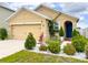 Charming single-Gathering home with a well-maintained front yard and a cozy, inviting entrance at 11124 Leland Groves Dr, Riverview, FL 33579