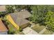 Aerial view of a single Gathering home showing the roof, driveway and surrounding greenery at 1236 Sweet Gum Dr, Brandon, FL 33511