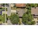 Overhead aerial view of home with mature trees, nice landscaping and driveway at 1236 Sweet Gum Dr, Brandon, FL 33511