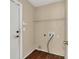 A functional laundry room featuring a utility sink and ample space for appliances at 1236 Sweet Gum Dr, Brandon, FL 33511