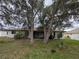 View of the backyard, showcasing the home's outdoor space at 13382 Drummond Ave, Port Charlotte, FL 33953