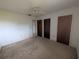 This bedroom has multiple closets for storage space at 13382 Drummond Ave, Port Charlotte, FL 33953