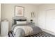 Stylishly furnished bedroom features modern decor, a comfortable bed, and ample closet space at 5079 Fairlane Dr, North Port, FL 34288